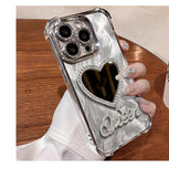 Suitable for Iphone 16Promax Phone Case 15Plus Heart-Shaped Mirror 14 Four Corner Airbag 1312 Feather Card 11XR Protective Cover